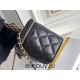 Chanel Vanity Makeup pouch 23A Black with gold hardware, handle, Camellia adjustable buckle, lambskin, 17x10x8cm.