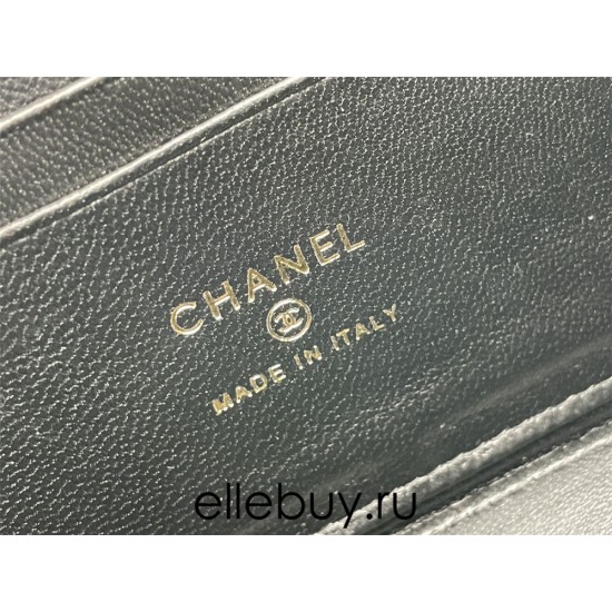 Chanel Vanity Makeup pouch 23A Black with gold hardware, handle, Camellia adjustable buckle, lambskin, 17x10x8cm.