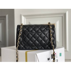 Chanel Classic Flap bag Mini 20 Black with gold hardware, Caviar leather, seamless.