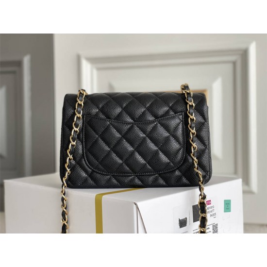 Chanel Classic Flap bag Mini 20 Black with gold hardware, Caviar leather, seamless.