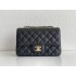 Chanel Classic Flap bag Mini 20 Black with gold hardware, Caviar leather, edge stitching.