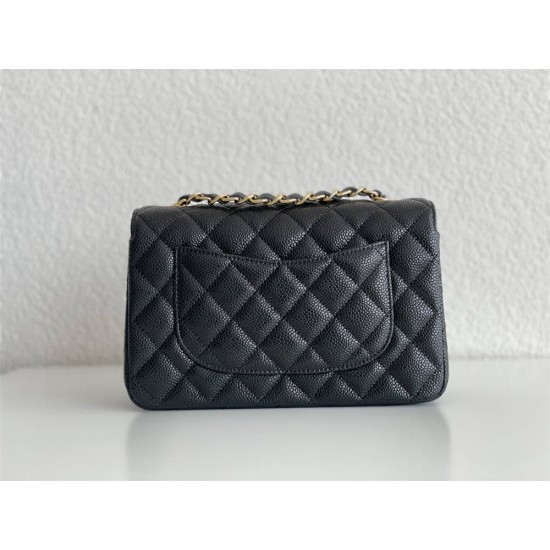 Chanel Classic Flap bag Mini 20 Black with gold hardware, Caviar leather, edge stitching.