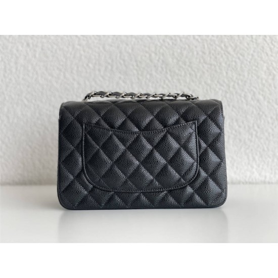 Chanel Classic Flap bag Mini 20 Black with silver hardware, Caviar leather, edge stitching.