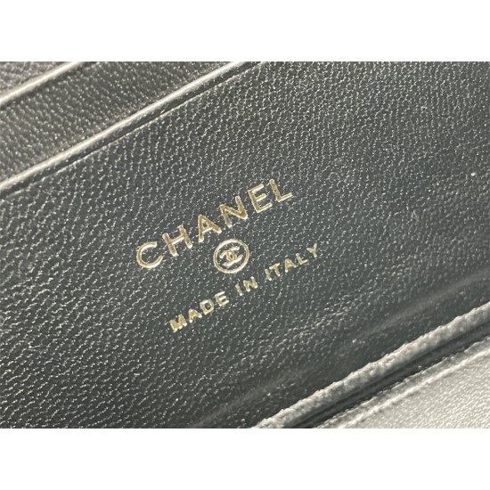 Chanel Vanity Makeup pouch 23A Black with gold hardware, handle, Camellia adjustable buckle, lambskin, 17x10x8cm.